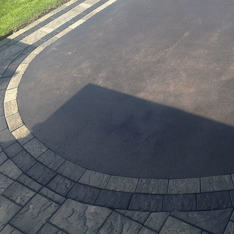 Curved driveway - Ottawa Interlock, Deck, Fence and Sod Landscaper